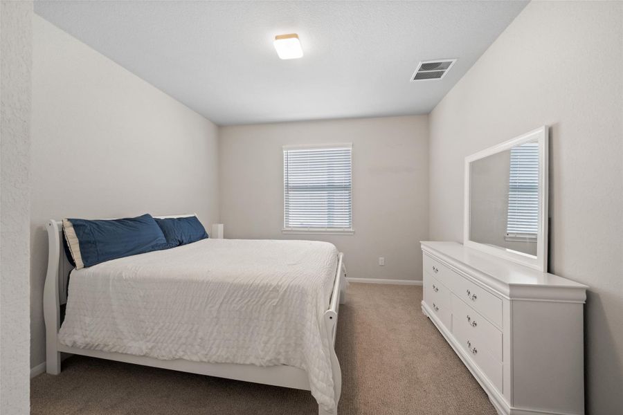 Furnished interior view inside a new home in Waterstone on Lake Conroe, Montgomery (Image 29).