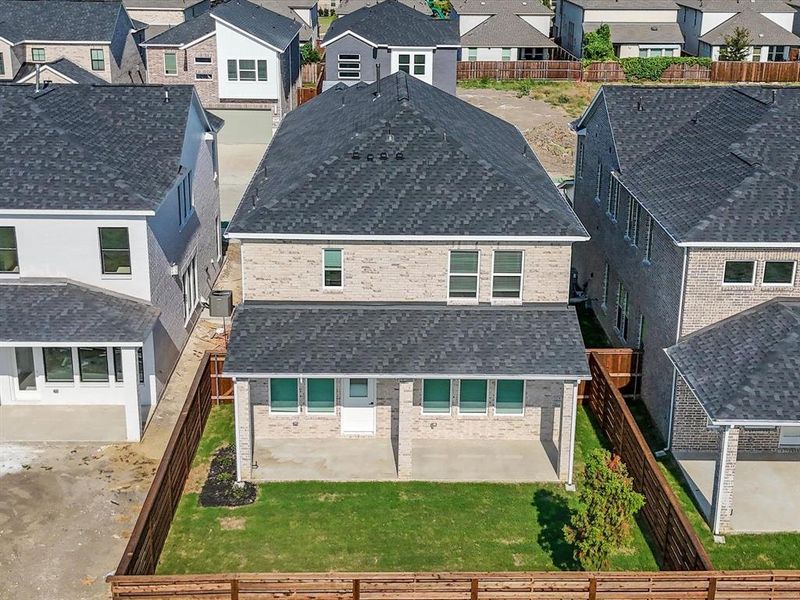 Front exterior of a new home in Royal Court, Little Elm, TX, highlighting curb appeal (Image 1). Front exterior of a new home in Royal Court, Little Elm, TX, highlighting curb appeal (Image 1).