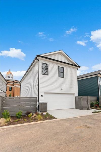 Front exterior of a new home in Harmony, Auburn, GA, highlighting curb appeal (Image 24). Front exterior of a new home in Harmony, Auburn, GA, highlighting curb appeal (Image 24).