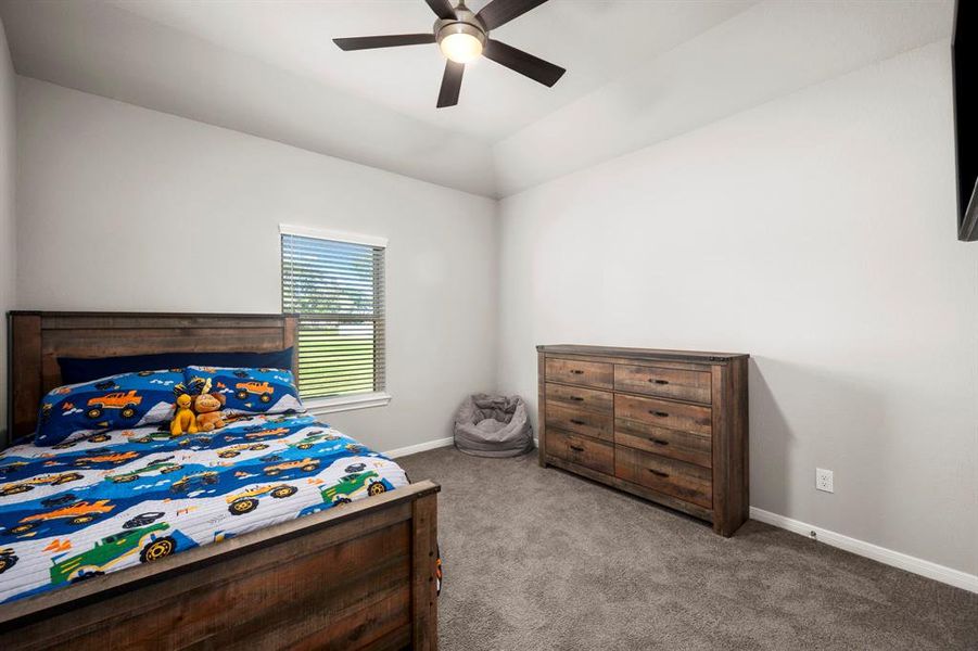 Third bedroom perfect as a home office. All bedrooms are spacious and feature high vaulted ceilings with fan and plush carpet.