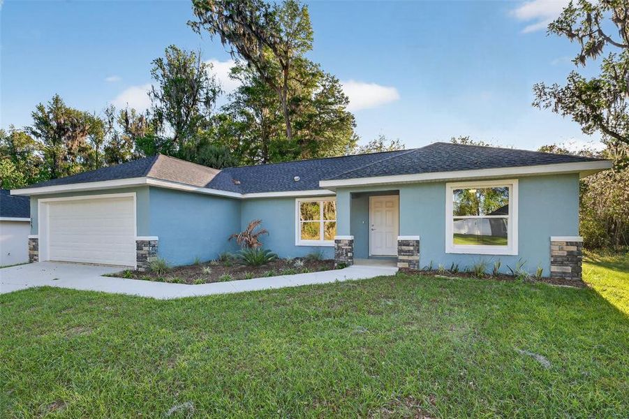 Exterior details and patio area of a home in , Summerfield (Image 13).