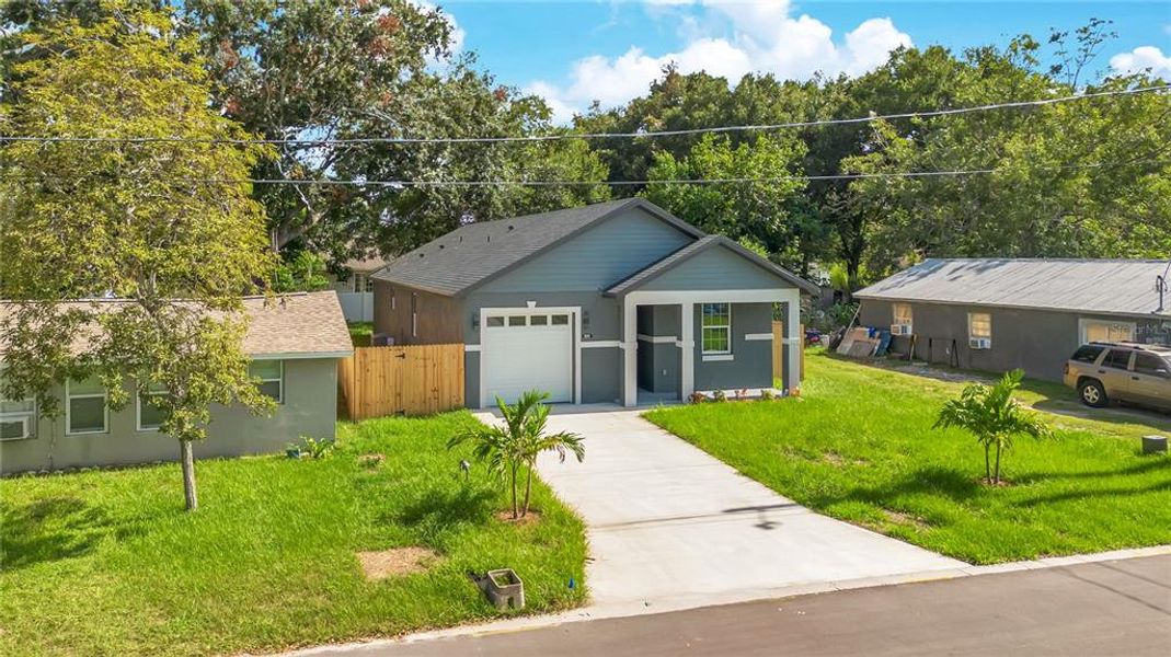 Front exterior of a new home in , Winter Garden, FL, highlighting curb appeal (Image 25).