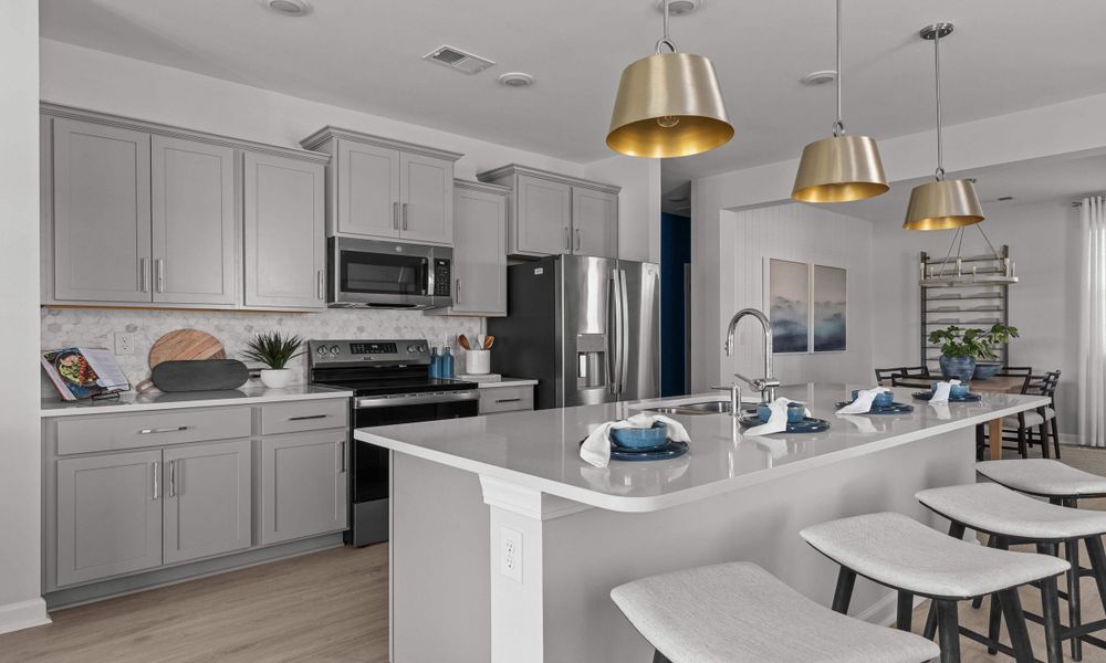 Representative furnished interior of a home built from the The Orchid by Chesapeake Homes in Traditions at Carolina Forest, Myrtle Beach (Image 7).