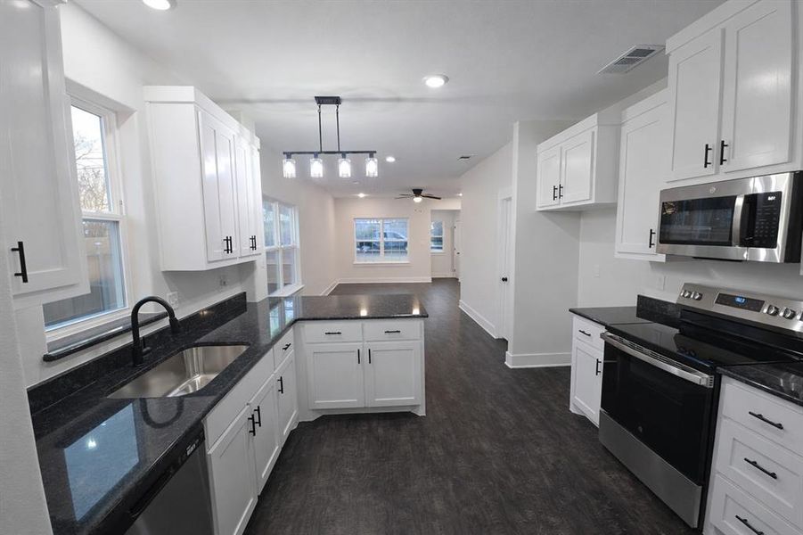 Furnished interior view inside a new home in , Denison (Image 10).