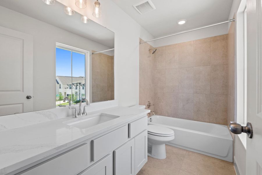 Furnished interior view inside a new home in Parmer Ranch, Georgetown (Image 10).