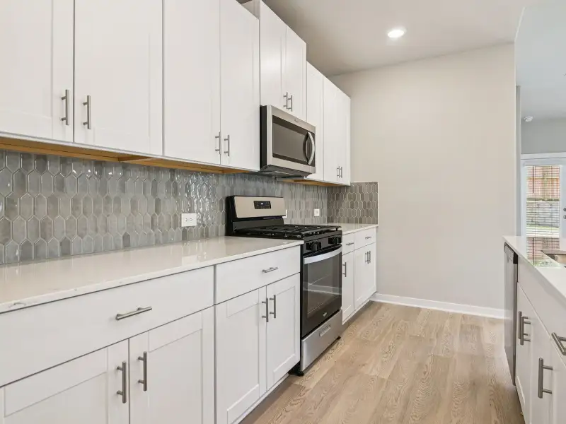 Furnished interior view inside a new home in Riviera Pines - Premier Series, Huffman (Image 5). Furnished interior view inside a new home in Riviera Pines - Premier Series, Huffman (Image 5).