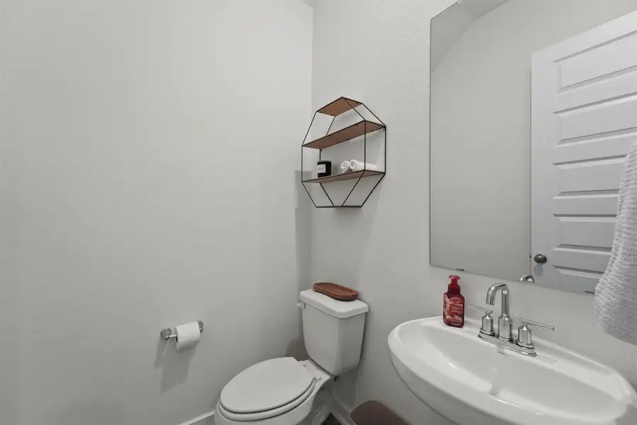 Downstairs powder room. Downstairs powder room.