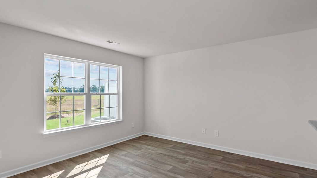 Spacious, unfurnished interior of a new home in Edinborough Townes, Gibsonville (Image 7).