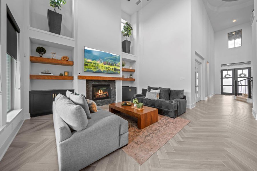 Open-concept design connects the living room to the entry and study, creating an easy flow. Tall ceilings enhance the space. Open-concept design connects the living room to the entry and study, creating an easy flow. Tall ceilings enhance the space.