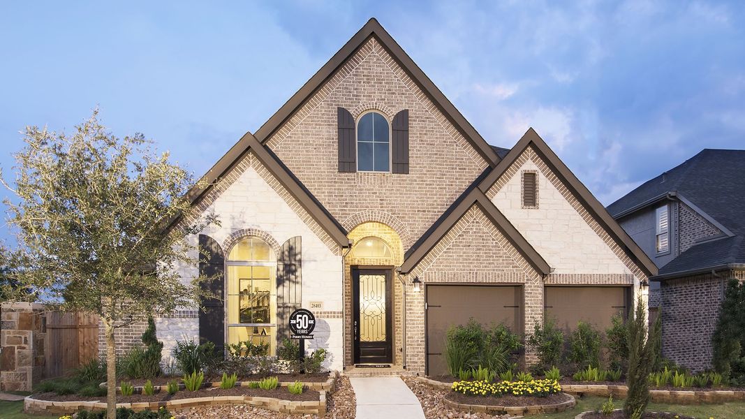 Representative exterior photo of a completed home built from the 2935W by Perry Homes in Meridiana, Rosharon, TX (Image 21).