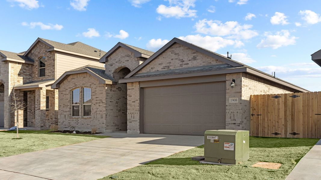 Representative exterior photo of a completed home built from the Live Oak by D.R. Horton in Northwest Passage, Midland, TX (Image 2). Representative exterior photo of a completed home built from the Live Oak by D.R. Horton in Northwest Passage, Midland, TX (Image 2).