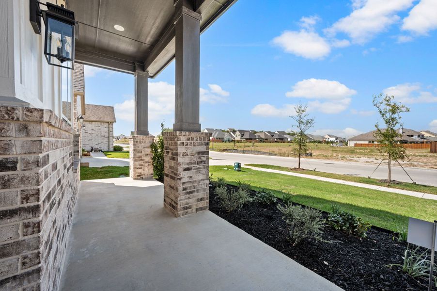 Exterior details and patio area of a home in Parks of Aledo, Aledo (Image 4).
