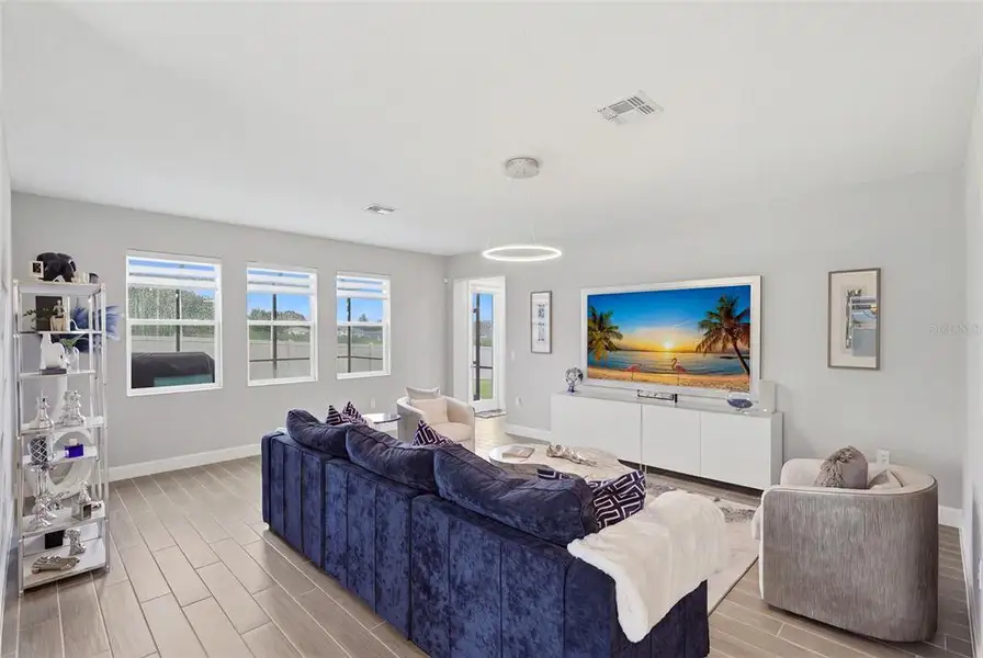 Furnished interior view inside a new home in , Apopka (Image 17).
