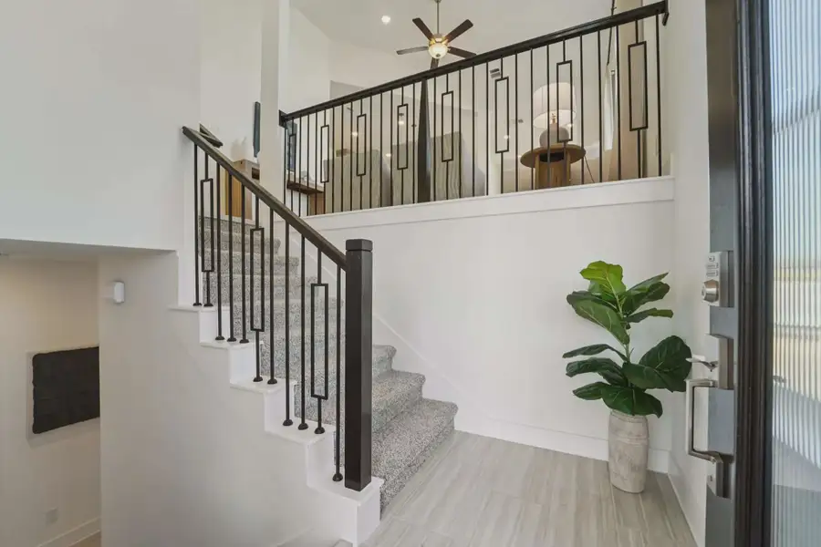 Representative furnished interior of a home built from the Margaux by Chesmar Homes in Bridgeland Chateau, Cypress (Image 12).