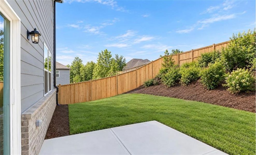 Exterior details and patio area of a home in Millers Pointe, Conyers (Image 3).