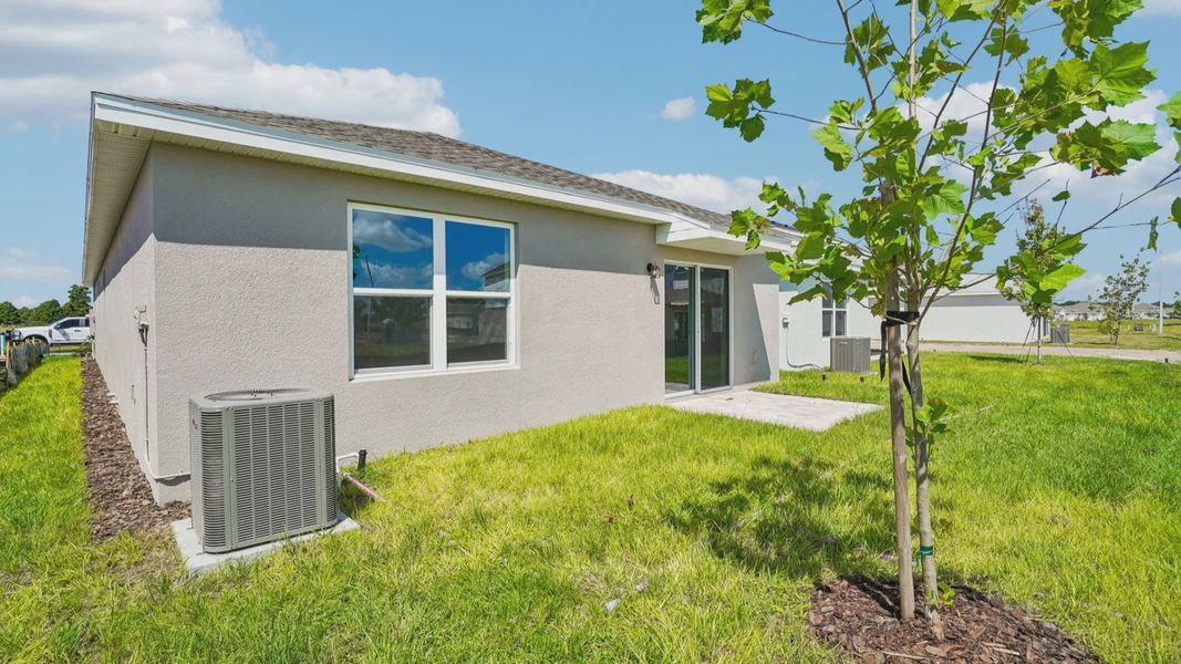 Exterior details and patio area of a home in Willowbrook North, Winter Haven (Image 23).