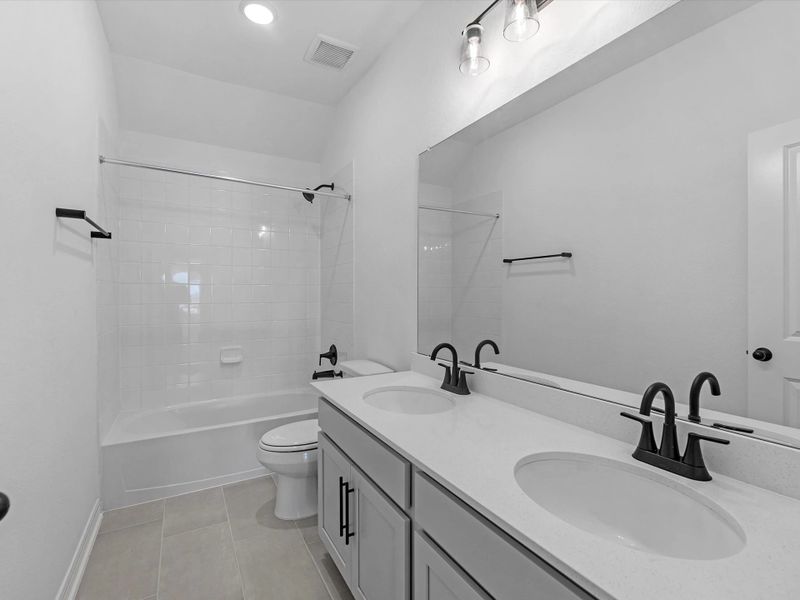 Furnished interior view inside a new home in Wildrye, Waller (Image 9).