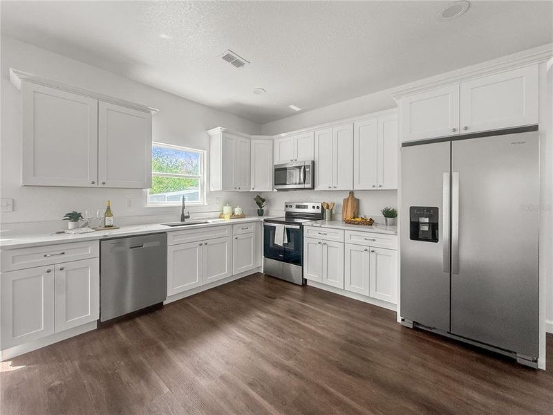 Furnished interior view inside a new home in , Alachua (Image 9).