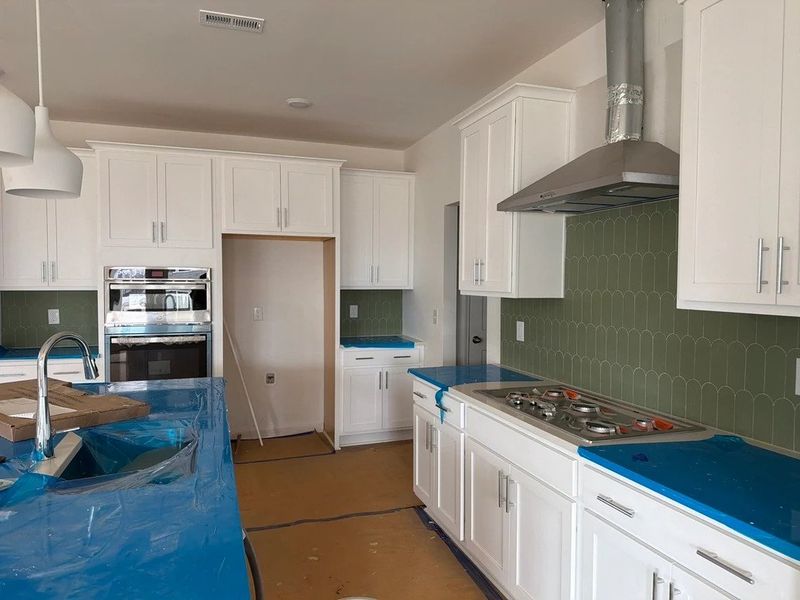 In-progress construction of a new home in Rowland's Grant, Fuquay Varina, NC (Image 10).