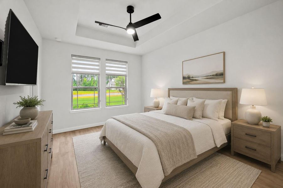 Another view of the 2nd bedroom with large windows overlooking the front yard.