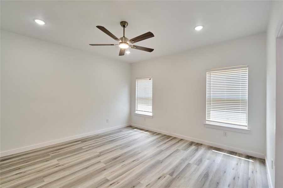 Interior room featuring light-toned wood-finish flooring