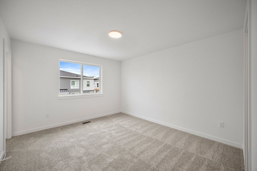 Spacious, unfurnished interior of a new home in The Commons at Victory Ridge, Colorado Springs (Image 18).