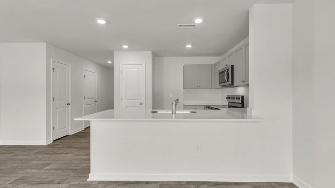 Furnished interior view inside a new home in The Townes at Wilson's Ridge, Smithfield (Image 8).