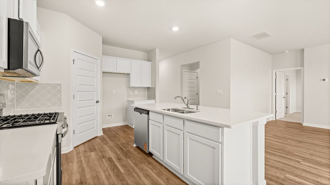 Representative furnished interior of a home built from the Elle by D.R. Horton in Preserve at Dove Creek, Statham (Image 8).