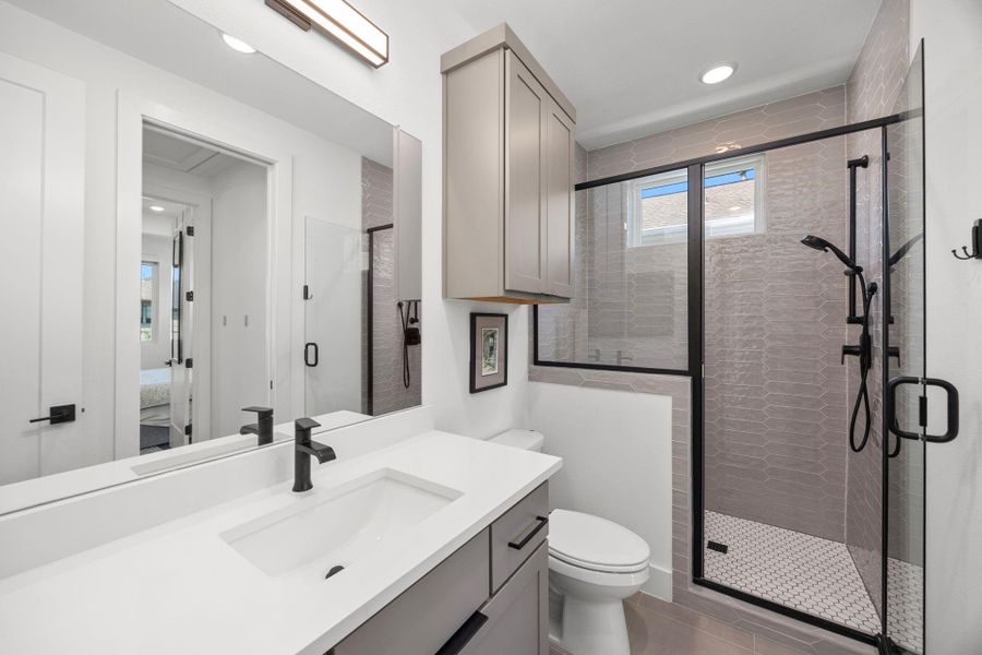 The 3 secondary bedrooms each have their own en suite bathroom with a walk-in shower.