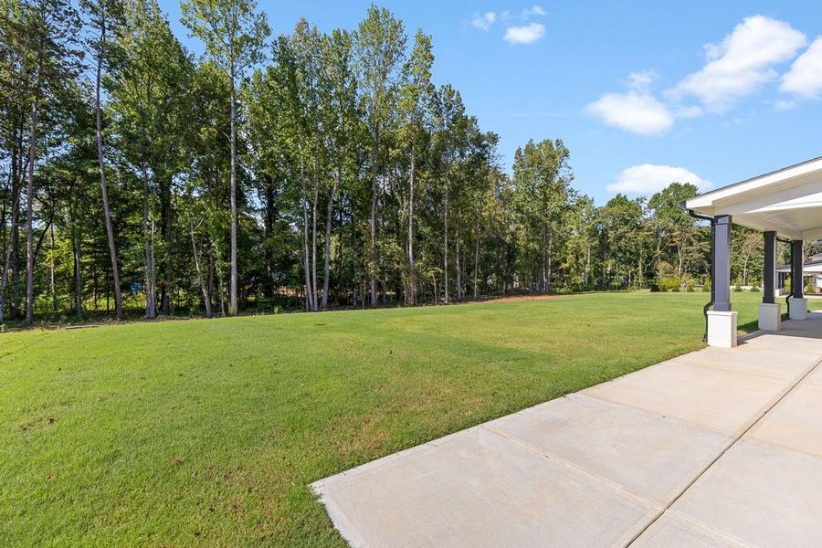 Front exterior of a new home in , Jefferson, GA, highlighting curb appeal (Image 21).