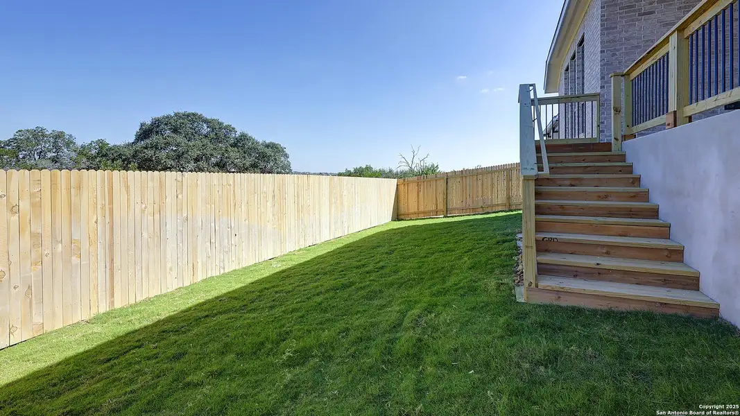 Exterior details and patio area of a home in Ladera 50', San Antonio (Image 4).