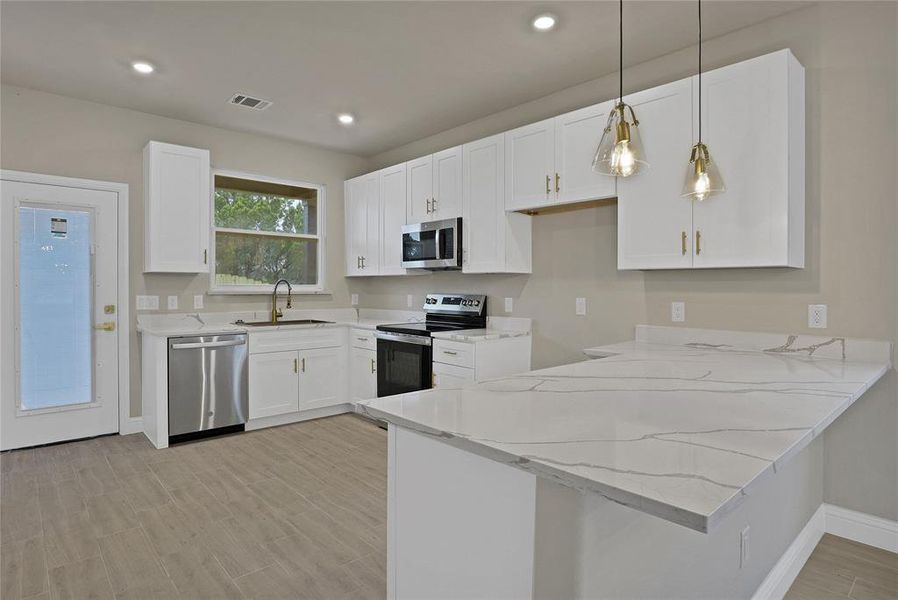 Furnished interior view inside a new home in , Granbury (Image 4).