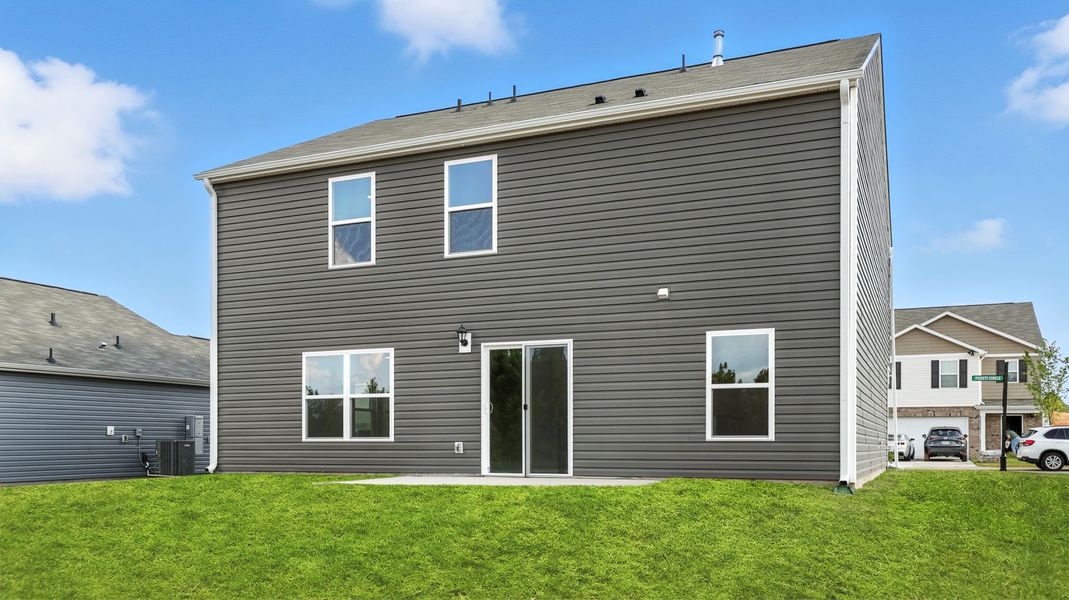 Exterior details and patio area of a home in Ravencrest, Roebuck (Image 21).
