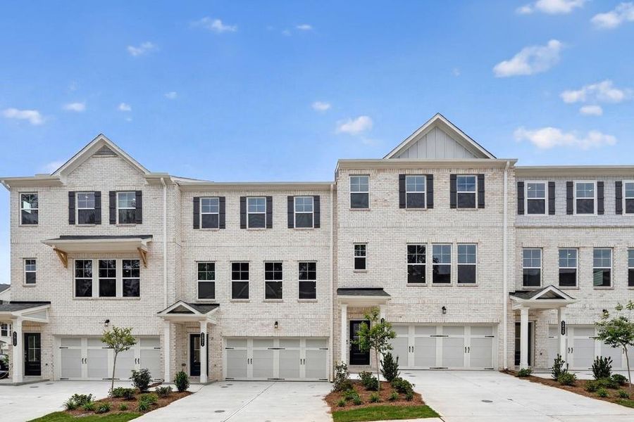Front exterior of a new home in Somerset at Veterans Memorial, Mableton, GA, highlighting curb appeal (Image 18). Front exterior of a new home in Somerset at Veterans Memorial, Mableton, GA, highlighting curb appeal (Image 18).