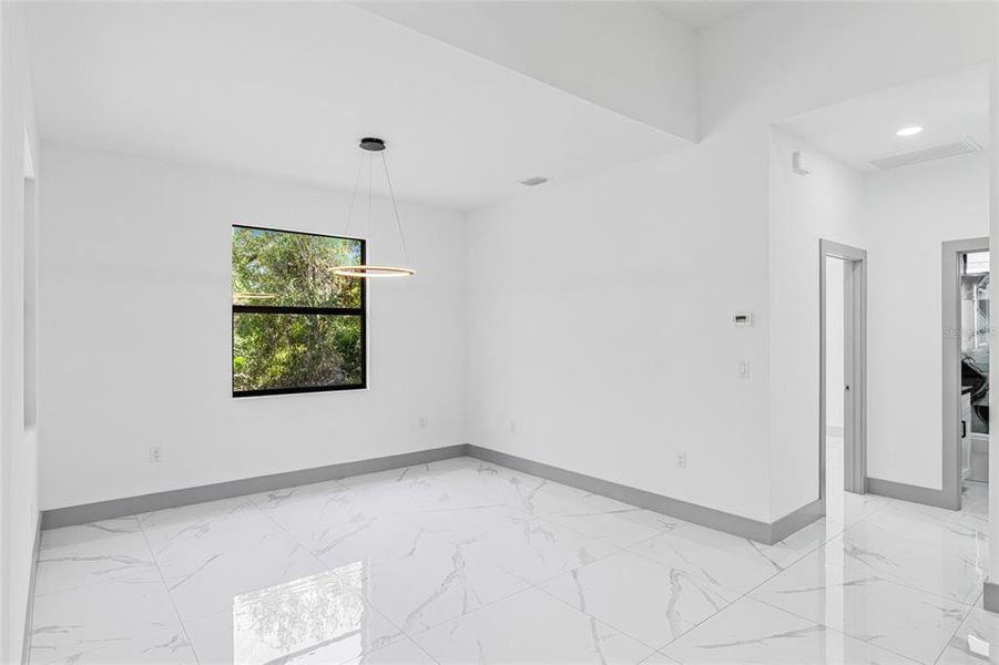 Spacious, unfurnished interior of a new home in , Port Charlotte (Image 32).