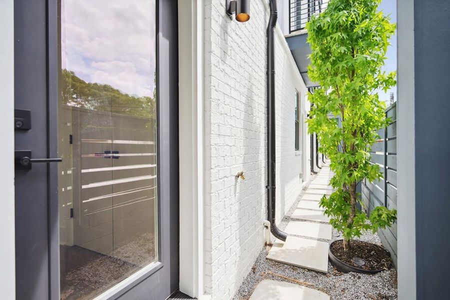 Exterior details and patio area of a home in Arlo Modern, Atlanta (Image 26).