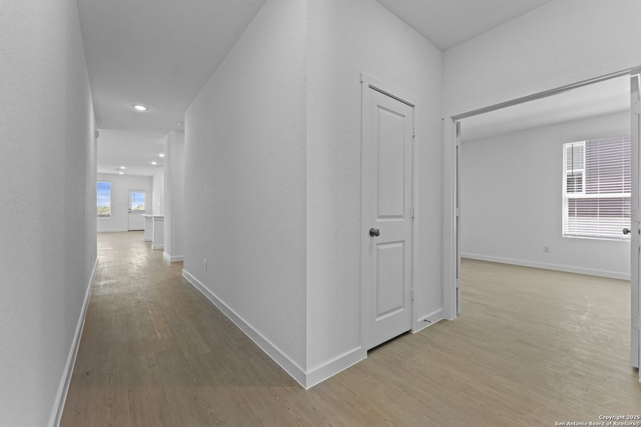 Spacious, unfurnished interior of a new home in Waterwheel: Coastline Collection, San Antonio (Image 21).