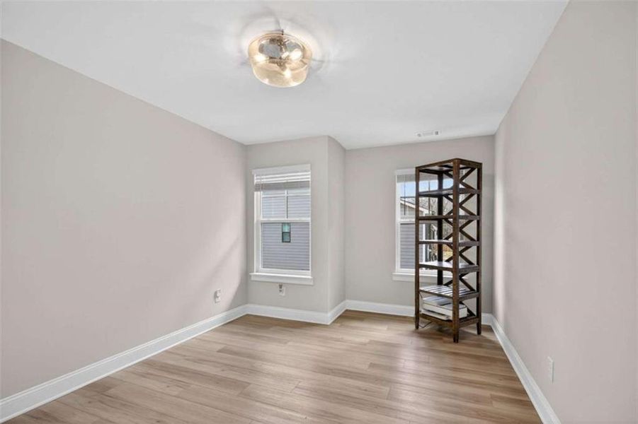 Spacious, unfurnished interior of a new home in The Village at Towne Lake, Woodstock (Image 22).