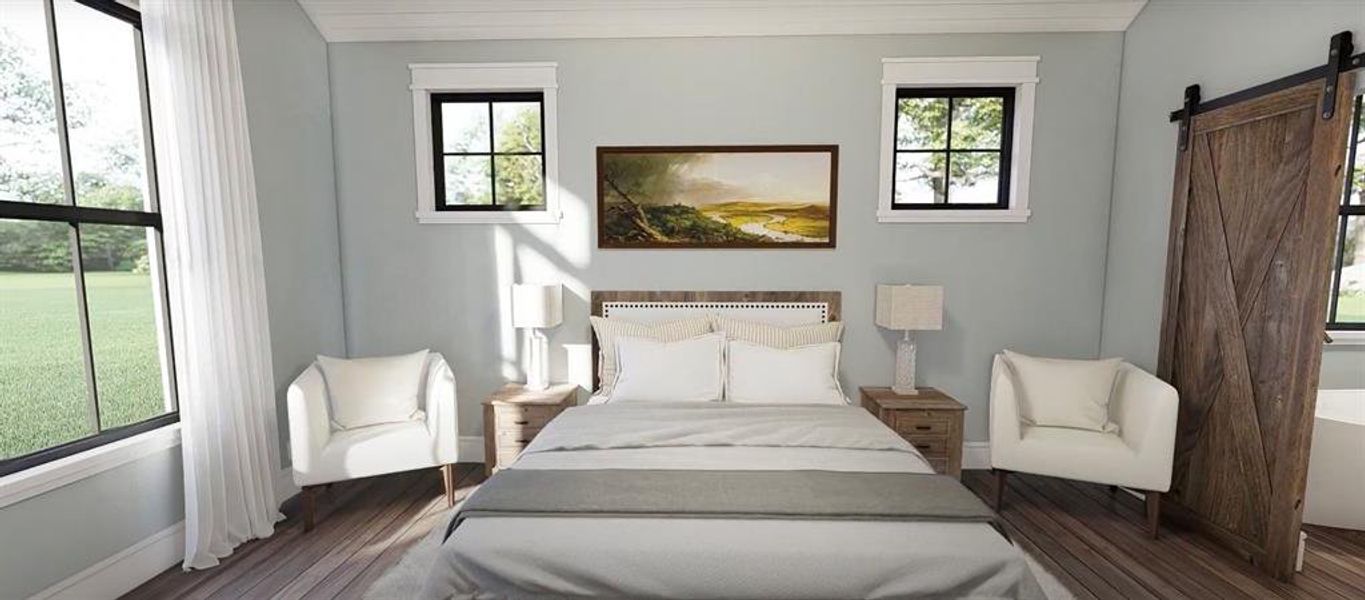 Bedroom featuring a barn door and dark hardwood / wood-style floors