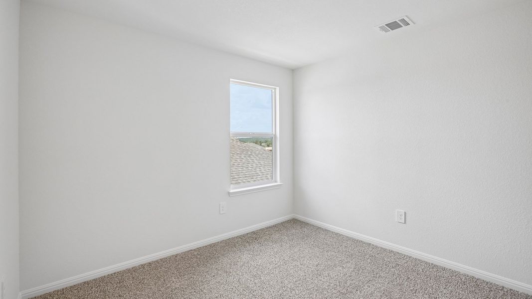 Spacious, unfurnished interior of a new home in Bar W Ranch, Leander (Image 38).