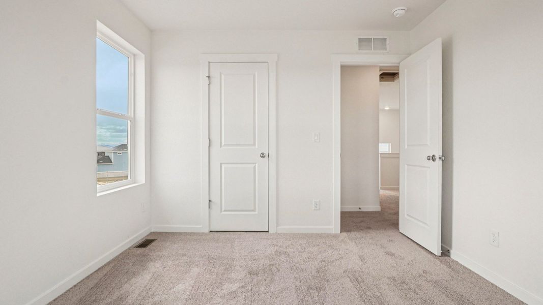Furnished interior view inside a new home in Windler Townhomes, Aurora (Image 38). Furnished interior view inside a new home in Windler Townhomes, Aurora (Image 38).