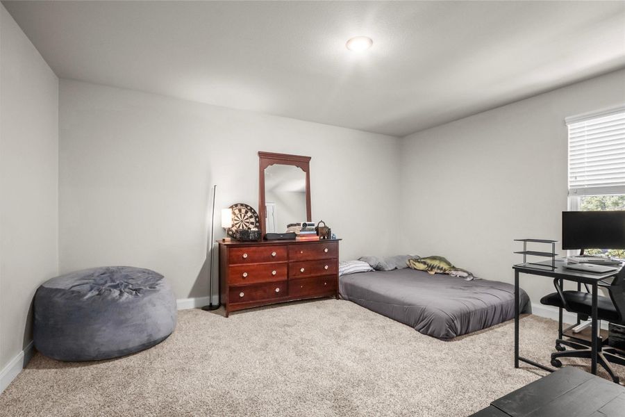 Furnished interior view inside a new home in , Conroe (Image 34).
