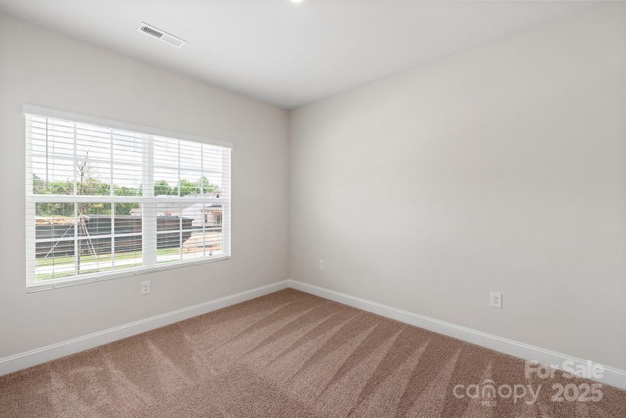 Spacious, unfurnished interior of a new home in Ascot Woods, Charlotte (Image 17).