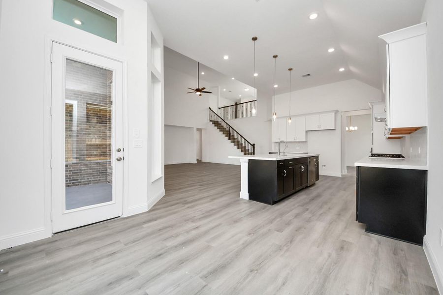 Furnished interior view inside a new home in ARTAVIA, Conroe (Image 7).