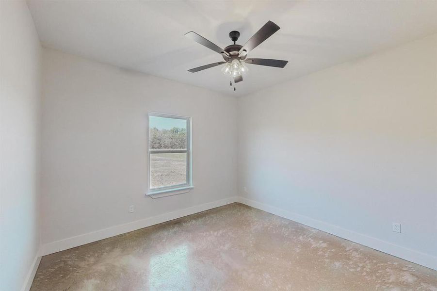 Spare room featuring ceiling fan