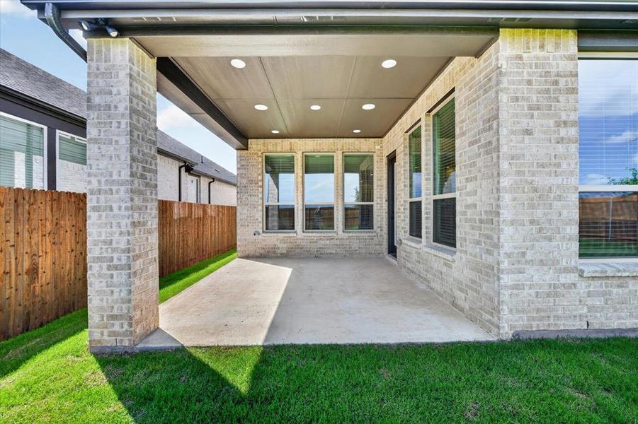 Exterior details and patio area of a home in Wildflower Ranch, Dish (Image 3). Exterior details and patio area of a home in Wildflower Ranch, Dish (Image 3).