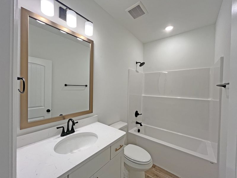 Furnished interior view inside a new home in Bird Song at Hammock Bay, Freeport (Image 12).