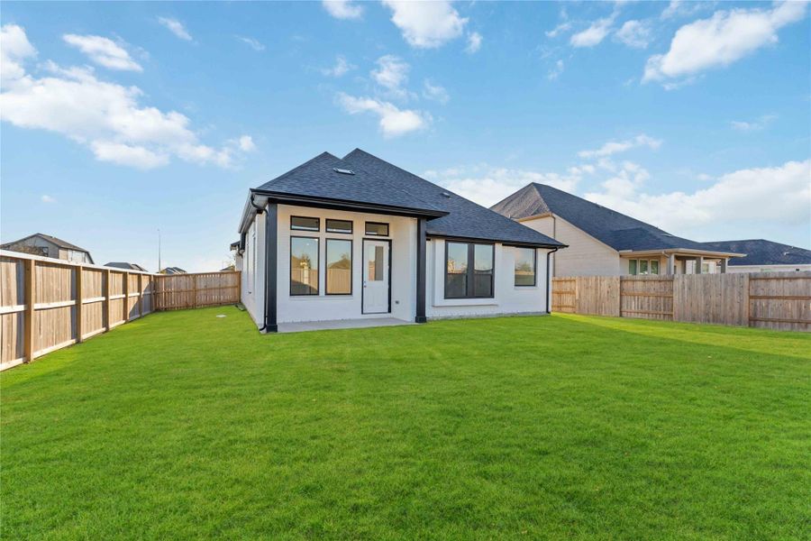 Exterior details and patio area of a home in Arabella on the Prairie, Richmond (Image 3).