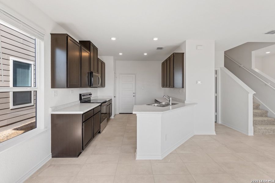 Furnished interior view inside a new home in Preserve at Culebra - Villa Collection, San Antonio (Image 13). Furnished interior view inside a new home in Preserve at Culebra - Villa Collection, San Antonio (Image 13).