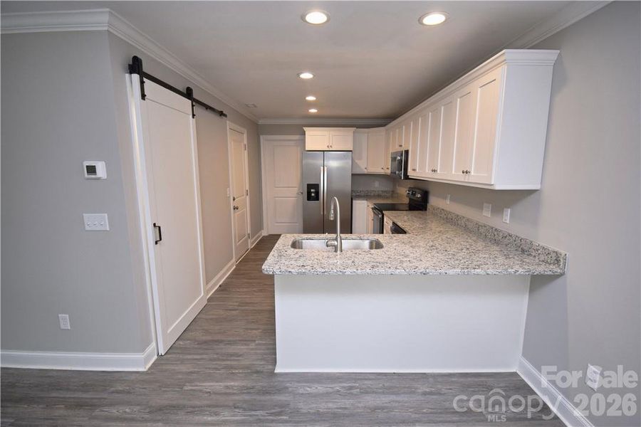Furnished interior view inside a new home in , Hickory (Image 7).